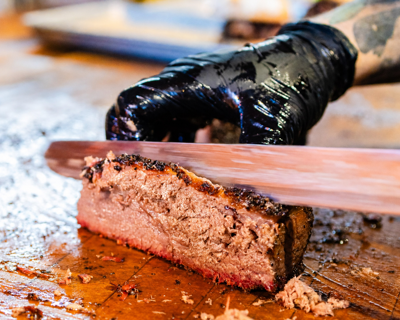 SoulBelly pitmaster carving smoked brisket